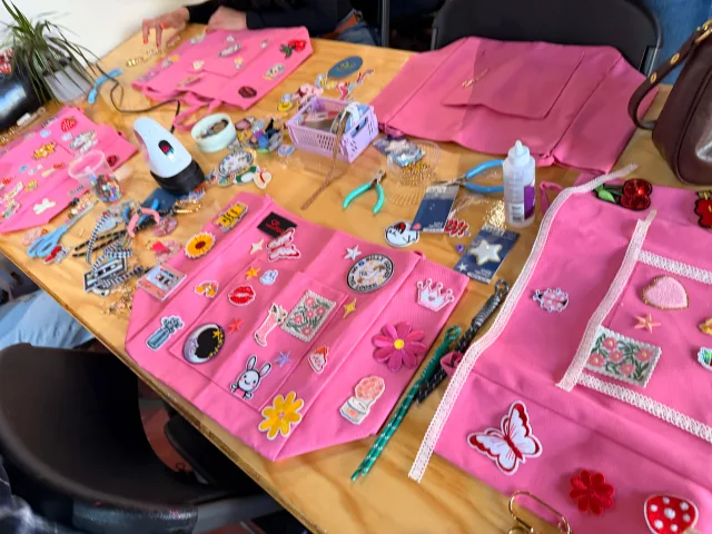 Gather and Glow Club craft supplies and welcome table